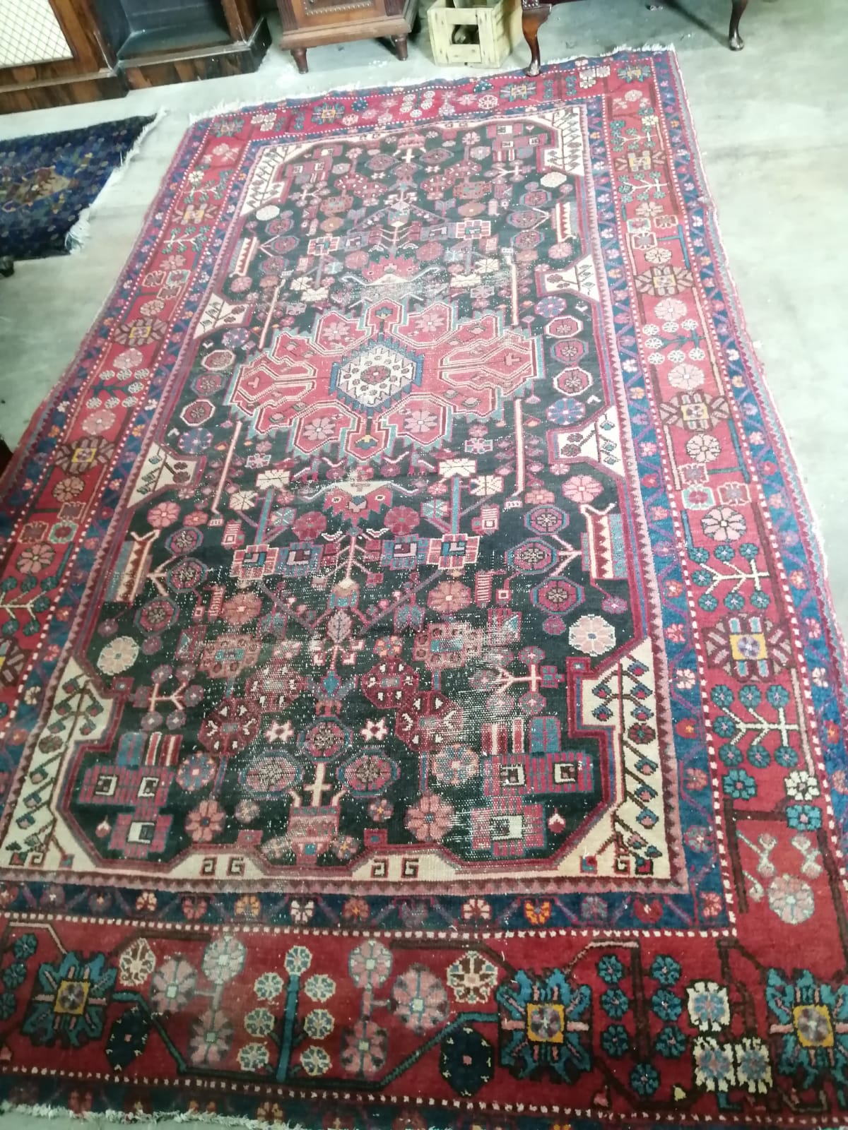 A Caucasian blue ground carpet, approx. 290 x 162cm together with a near pair of smaller North West Persian blue ground rugs